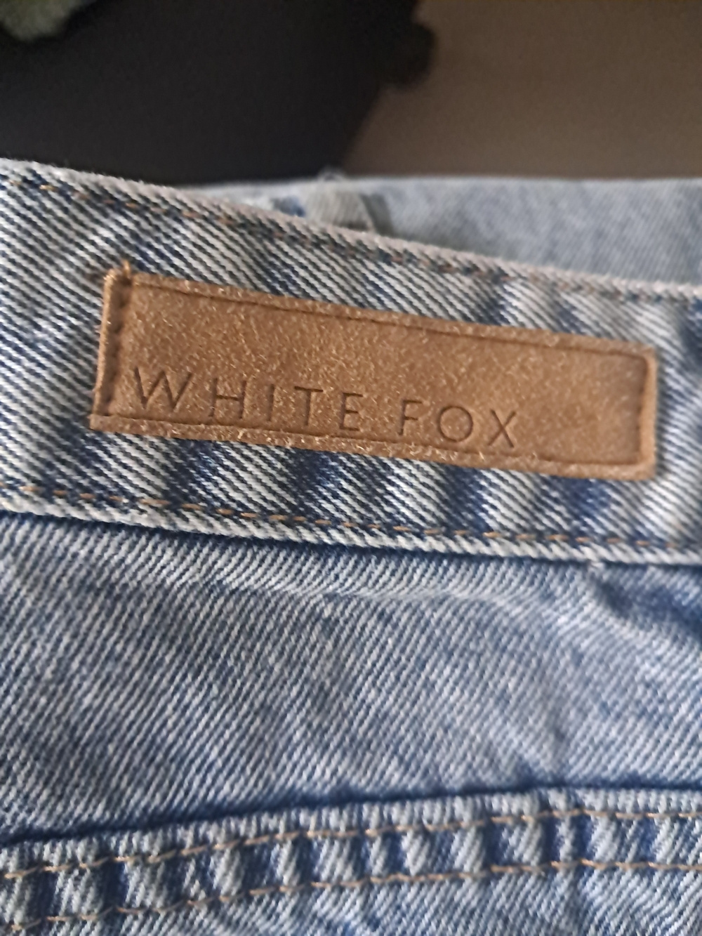 White Fox Boutique Light Blue Denim Jeans with Brown Patch